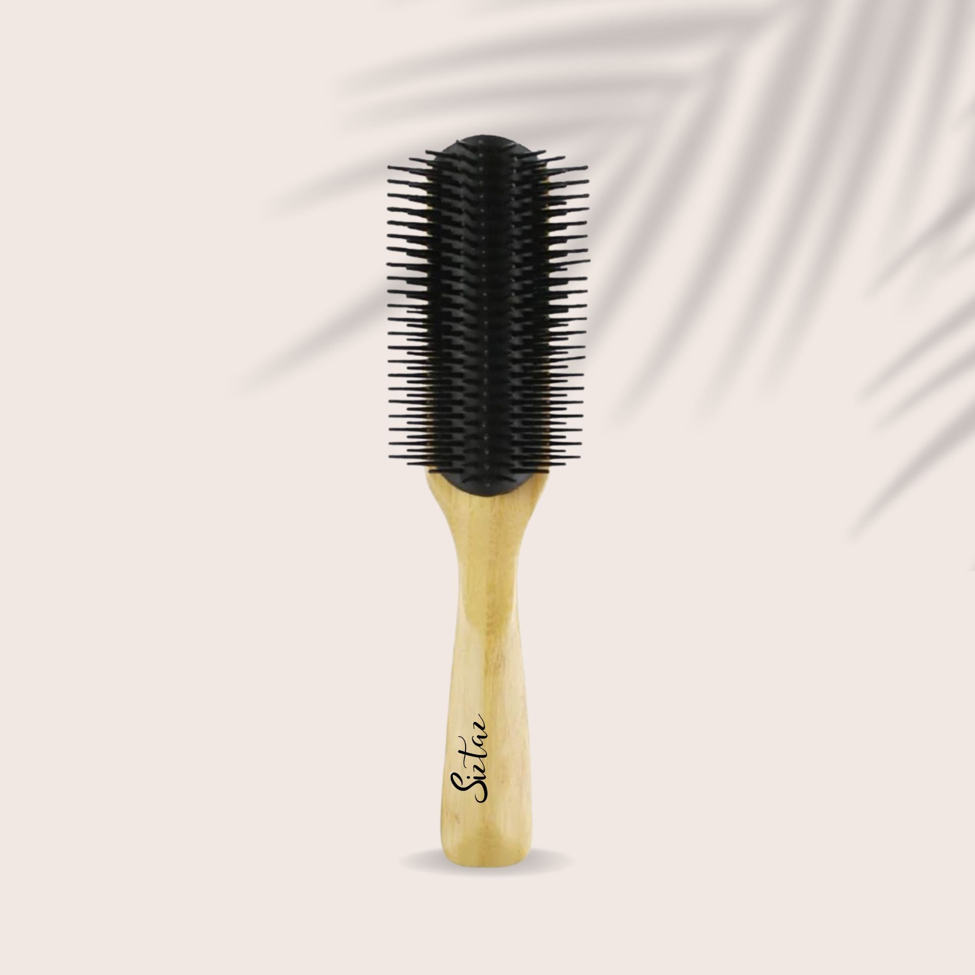 Brosse coiffante pour des boucles définies