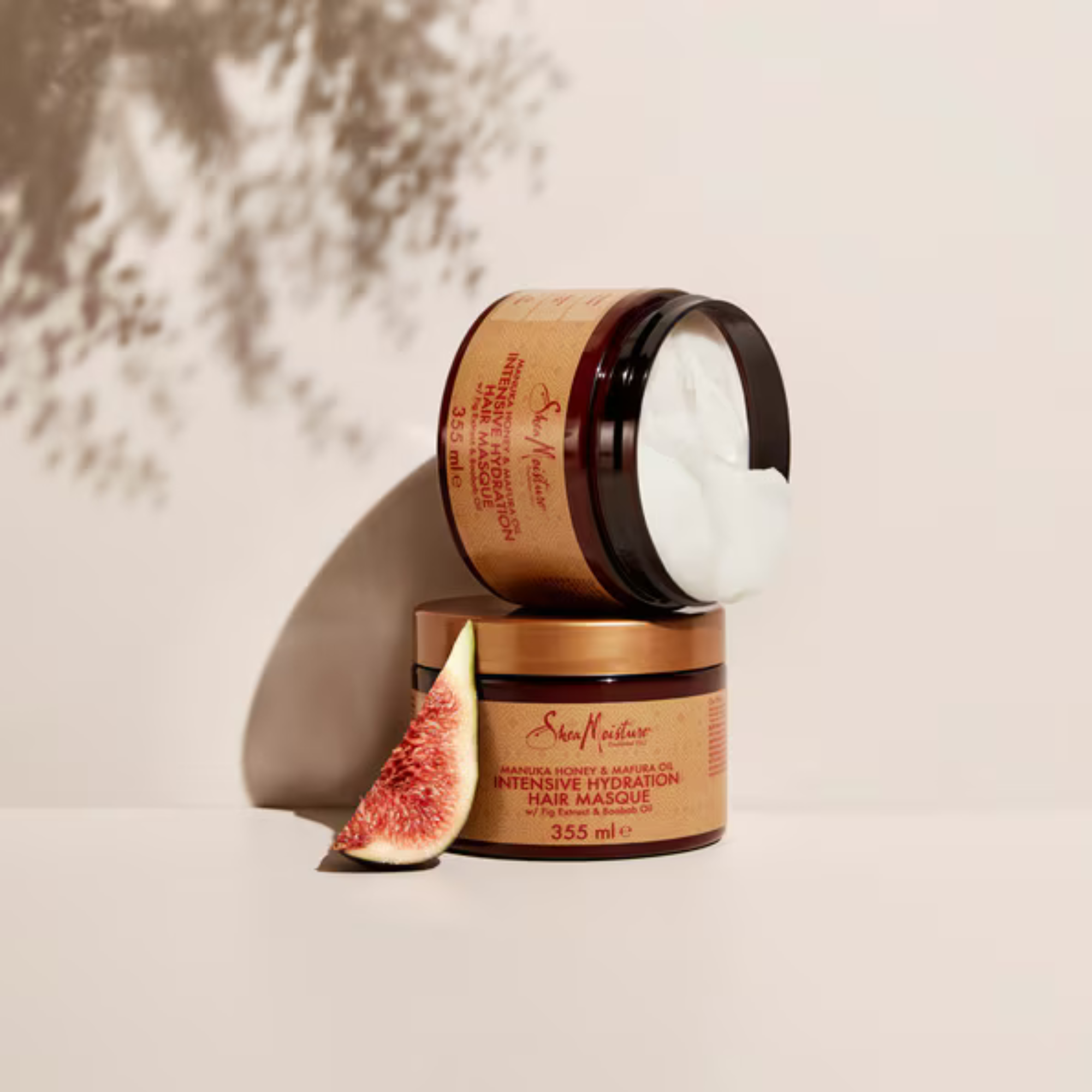 SheaMoisture Manuka Honey & Mafura Oil Intensive Hydration Masque, eine tiefenwirksame Haarmaske mit Manuka-Honig und Mafura-Öl, die intensive Feuchtigkeit spendet, das Haar stärkt und Frizz reduziert.