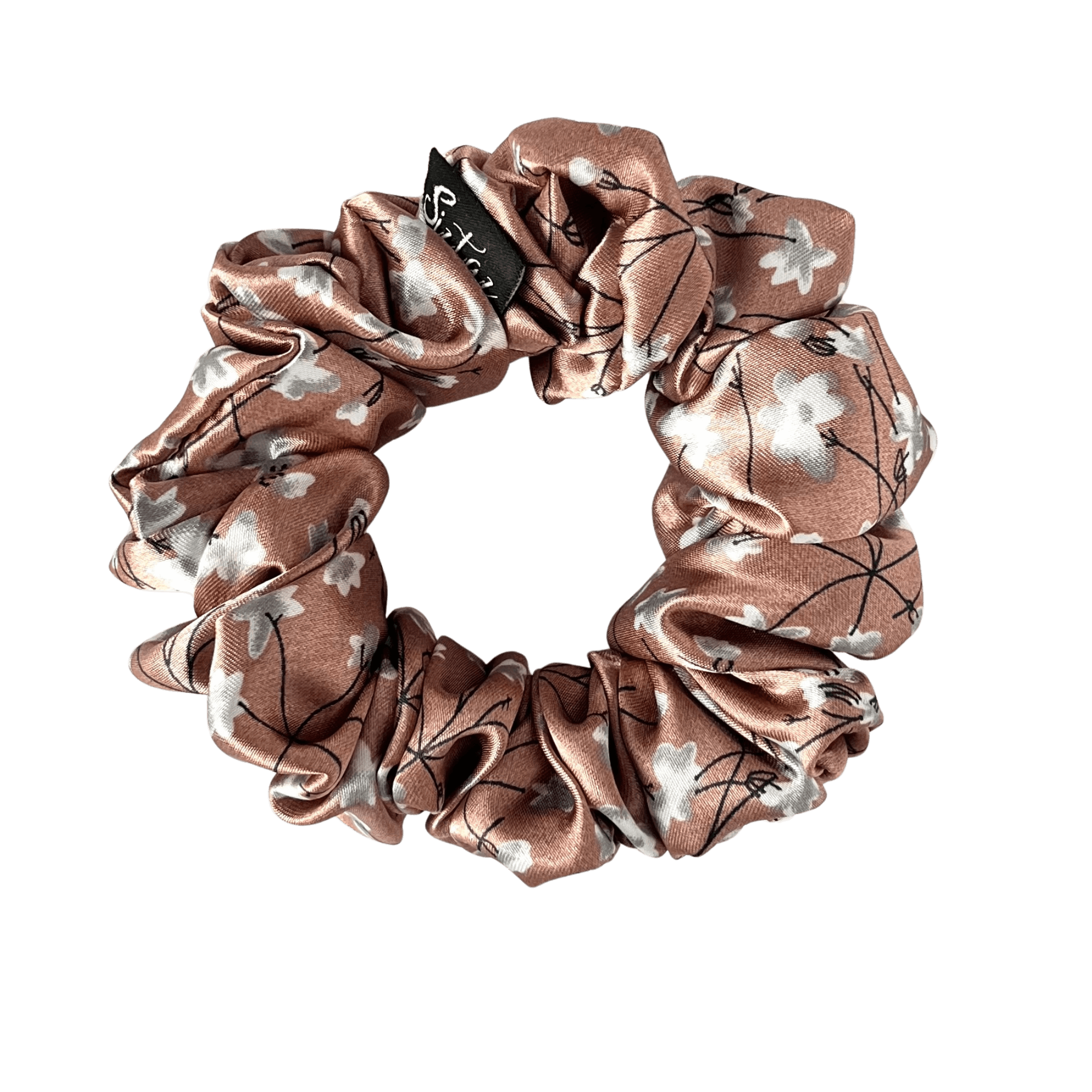 Satin-Scrunchie mit herzigem Blumendruck. Dieser Scrunchie aus hochwertigem Satin, braun mit Blumen ist besonders sanft zu deinem Haar und bietet einen festen Halt – ganz ohne Ziepen oder Haarbruch.